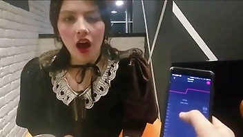 Cute young girl gets vibrated her pussy at public place