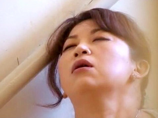 Sexual satisfaction on a Tokyo balcony with a horny MILF from Nippon.