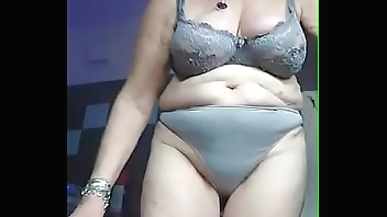 Granny fucks hairy pussy with cucumber