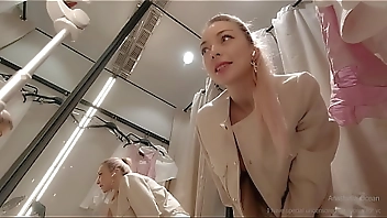 Online date in fitting room with open curtain. Public video call.